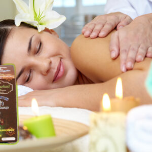Portrait of young female enjoying the procedure of massage with Black Plai Body Massage Balm